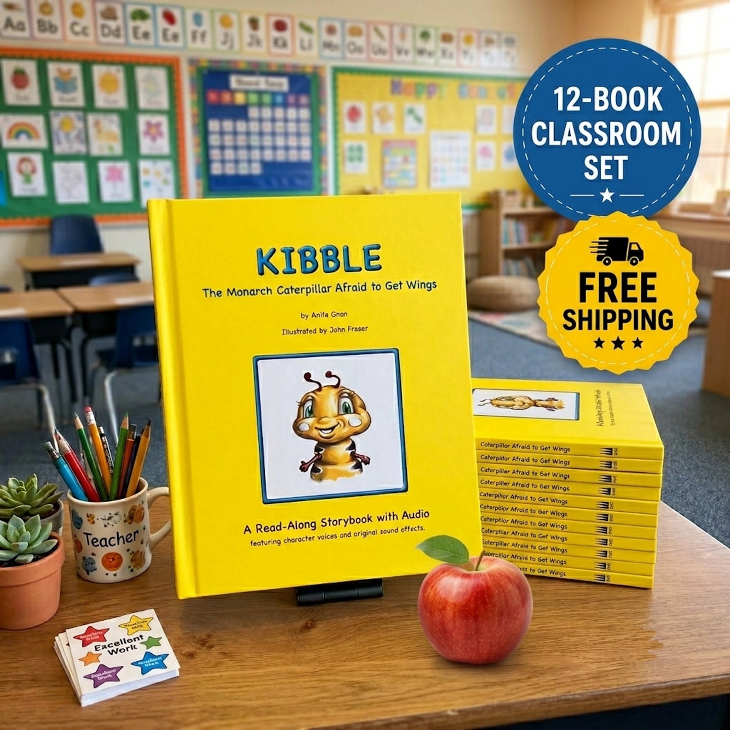 A 12-book classroom set of Kibble the Monarch Caterpillar Afraid to Get Wings storybook with audio by Anita Gnan image with one of the Kibble books standing on a classroom desk with 11 of the Kibble books stacked behind it. There are crayons and a colored-in picture of a monarch butterfly in the foreground with a globe and other classroom books in the background. 
