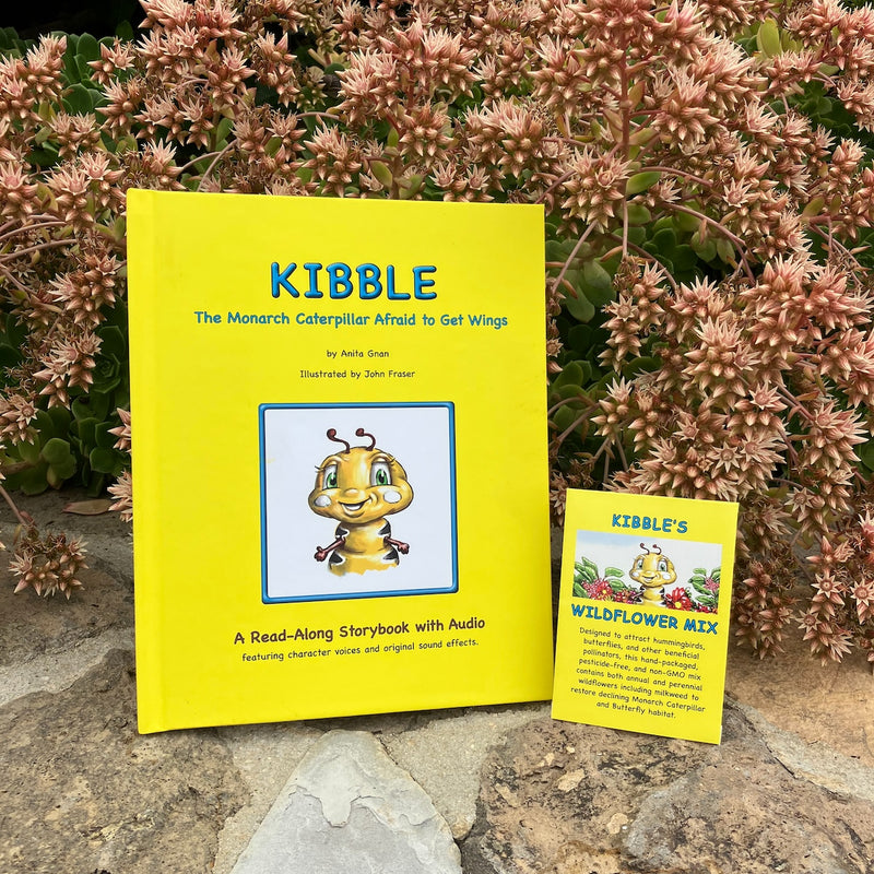 A read along monarch butterfly book with audio for kids about fear and courage titled Kibble the Monarch Caterpillar Afraid to Get Wings by Anita Gnan. Produced and published by West Creek Media. The book is on the left in front of natural floral habitat. Next to it,  a pack of free Kibble Wildflower Mix seeds for growing pollinator gardens.